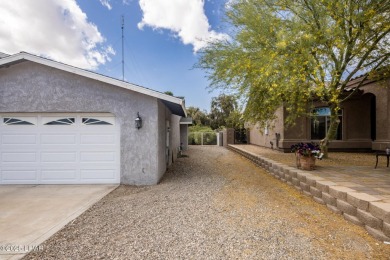 Welcome to 1811 Duel Dr. This original owner home is nestled on London Bridge Golf Course in Arizona - for sale on GolfHomes.com, golf home, golf lot