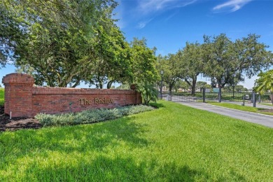 Maintenance-Free Luxury Living with Waterfall Views in on Grasslands Golf and Country Club in Florida - for sale on GolfHomes.com, golf home, golf lot