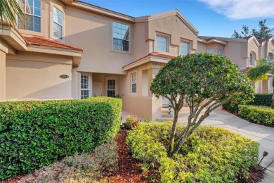 Maintenance-Free Luxury Living with Waterfall Views in on Grasslands Golf and Country Club in Florida - for sale on GolfHomes.com, golf home, golf lot