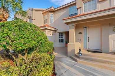 Maintenance-Free Luxury Living with Waterfall Views in on Grasslands Golf and Country Club in Florida - for sale on GolfHomes.com, golf home, golf lot