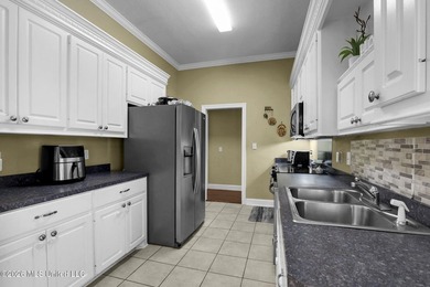 Welcome Home, Nestled within a sought-after golf course on Patrick Farms Golf Club in Mississippi - for sale on GolfHomes.com, golf home, golf lot