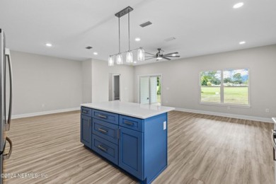 This 2,465 total sf brand new construction open floor concept on Keystone Heights Golf and Country Club in Florida - for sale on GolfHomes.com, golf home, golf lot