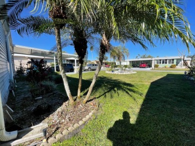 Swiss Golf & Tennis 55+ Community - 2 Bedroom, 2 Bath Home - on Lake Henry Golf Club in Florida - for sale on GolfHomes.com, golf home, golf lot