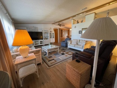 Swiss Golf & Tennis 55+ Community - 2 Bedroom, 2 Bath Home - on Lake Henry Golf Club in Florida - for sale on GolfHomes.com, golf home, golf lot
