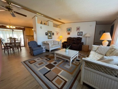 Swiss Golf & Tennis 55+ Community - 2 Bedroom, 2 Bath Home - on Lake Henry Golf Club in Florida - for sale on GolfHomes.com, golf home, golf lot