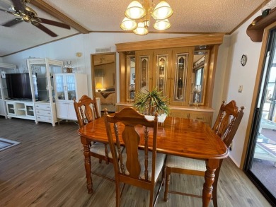 Swiss Golf & Tennis 55+ Community - 2 Bedroom, 2 Bath Home - on Lake Henry Golf Club in Florida - for sale on GolfHomes.com, golf home, golf lot