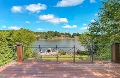 Welcome to your dream lakefront retreat! This stunning 6-bedroom on Lake Mohawk Golf Club in Ohio - for sale on GolfHomes.com, golf home, golf lot