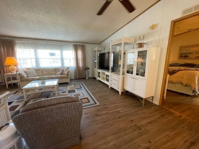 Swiss Golf & Tennis 55+ Community - 2 Bedroom, 2 Bath Home - on Lake Henry Golf Club in Florida - for sale on GolfHomes.com, golf home, golf lot