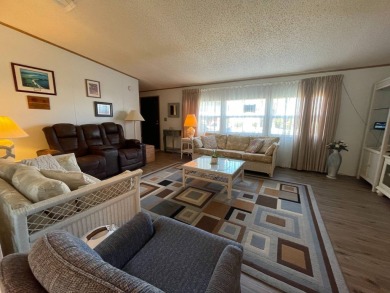 Swiss Golf & Tennis 55+ Community - 2 Bedroom, 2 Bath Home - on Lake Henry Golf Club in Florida - for sale on GolfHomes.com, golf home, golf lot