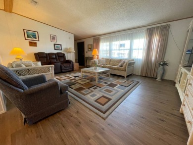 Swiss Golf & Tennis 55+ Community - 2 Bedroom, 2 Bath Home - on Lake Henry Golf Club in Florida - for sale on GolfHomes.com, golf home, golf lot