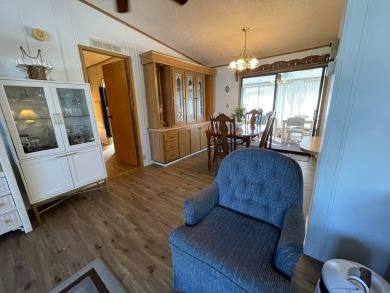 Swiss Golf & Tennis 55+ Community - 2 Bedroom, 2 Bath Home - on Lake Henry Golf Club in Florida - for sale on GolfHomes.com, golf home, golf lot