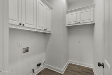 **FULLY REMODELED, BRAND NEW ROOF, GERMANTOWN SCHOOL ZONE, ON on Lake Caroline Golf Club in Mississippi - for sale on GolfHomes.com, golf home, golf lot