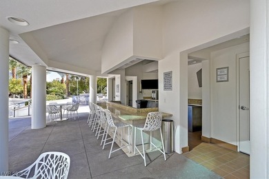 Set on the 10th floor, this two-bedroom plus den, two-bath on Las Vegas Country Club in Nevada - for sale on GolfHomes.com, golf home, golf lot