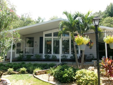 Prepare to fall in love with this gorgeous home! From the moment on Tomoka Oaks Golf and Country Club in Florida - for sale on GolfHomes.com, golf home, golf lot