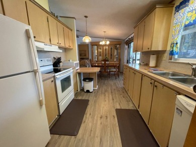 Swiss Golf & Tennis 55+ Community - 2 Bedroom, 2 Bath Home - on Lake Henry Golf Club in Florida - for sale on GolfHomes.com, golf home, golf lot