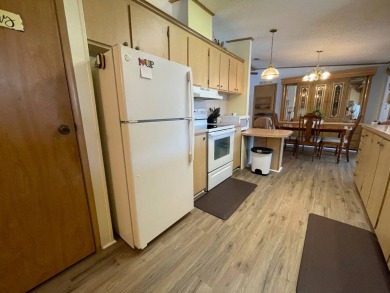 Swiss Golf & Tennis 55+ Community - 2 Bedroom, 2 Bath Home - on Lake Henry Golf Club in Florida - for sale on GolfHomes.com, golf home, golf lot
