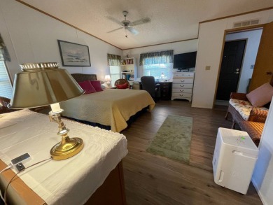 Swiss Golf & Tennis 55+ Community - 2 Bedroom, 2 Bath Home - on Lake Henry Golf Club in Florida - for sale on GolfHomes.com, golf home, golf lot