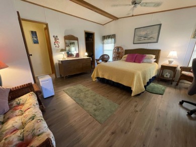 Swiss Golf & Tennis 55+ Community - 2 Bedroom, 2 Bath Home - on Lake Henry Golf Club in Florida - for sale on GolfHomes.com, golf home, golf lot