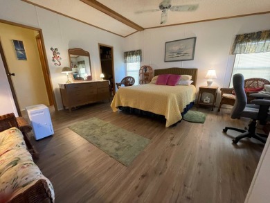 Swiss Golf & Tennis 55+ Community - 2 Bedroom, 2 Bath Home - on Lake Henry Golf Club in Florida - for sale on GolfHomes.com, golf home, golf lot