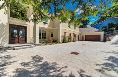 Welcome to your dream lakefront retreat! This stunning 6-bedroom on Lake Mohawk Golf Club in Ohio - for sale on GolfHomes.com, golf home, golf lot