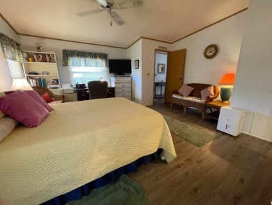 Swiss Golf & Tennis 55+ Community - 2 Bedroom, 2 Bath Home - on Lake Henry Golf Club in Florida - for sale on GolfHomes.com, golf home, golf lot