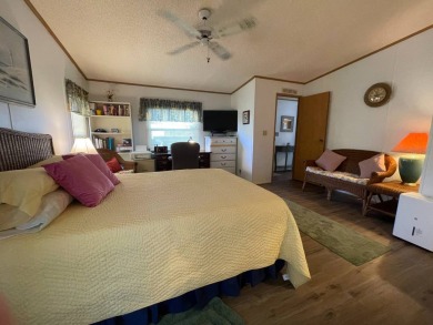 Swiss Golf & Tennis 55+ Community - 2 Bedroom, 2 Bath Home - on Lake Henry Golf Club in Florida - for sale on GolfHomes.com, golf home, golf lot