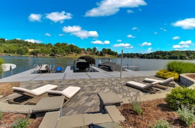 Welcome to your dream lakefront retreat! This stunning 6-bedroom on Lake Mohawk Golf Club in Ohio - for sale on GolfHomes.com, golf home, golf lot