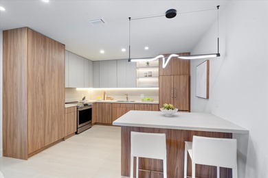 This light-filled first-floor condo has been completely on Polo Club of Boca Raton in Florida - for sale on GolfHomes.com, golf home, golf lot