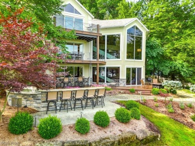 Welcome to your dream lakefront retreat! This stunning 6-bedroom on Lake Mohawk Golf Club in Ohio - for sale on GolfHomes.com, golf home, golf lot