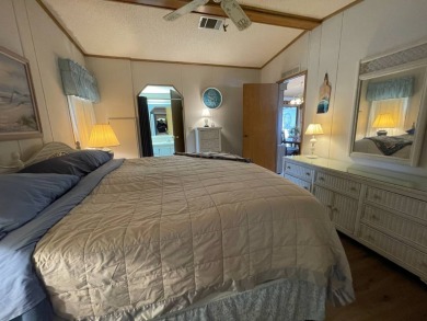 Swiss Golf & Tennis 55+ Community - 2 Bedroom, 2 Bath Home - on Lake Henry Golf Club in Florida - for sale on GolfHomes.com, golf home, golf lot