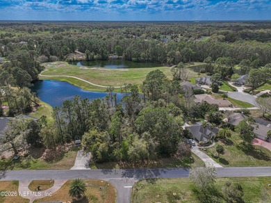 This beautiful lot is nestled in the gated community of Magnolia on Magnolia Point Golf and Country Club in Florida - for sale on GolfHomes.com, golf home, golf lot