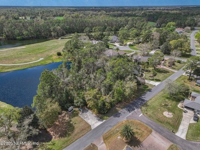 This beautiful lot is nestled in the gated community of Magnolia on Magnolia Point Golf and Country Club in Florida - for sale on GolfHomes.com, golf home, golf lot