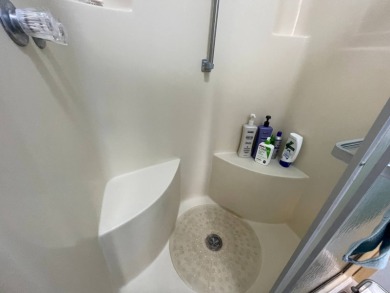 Down 5K! Swiss Golf & Tennis 55+ Community -Charming, mostly on Lake Henry Golf Club in Florida - for sale on GolfHomes.com, golf home, golf lot