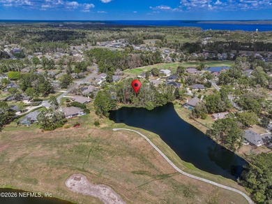 This beautiful lot is nestled in the gated community of Magnolia on Magnolia Point Golf and Country Club in Florida - for sale on GolfHomes.com, golf home, golf lot