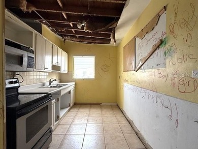 Great opportunity for investors, flippers, or buyers looking to on Port Charlotte Golf Club in Florida - for sale on GolfHomes.com, golf home, golf lot