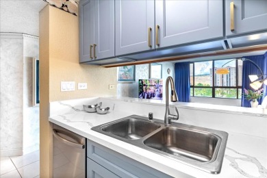 This bright and breezy corner unit features an open floorplan on Honolulu Country Club in Hawaii - for sale on GolfHomes.com, golf home, golf lot