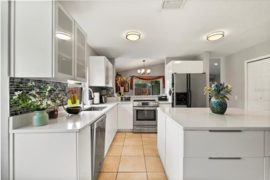 Welcome to this beautifully remodeled 5-bedroom, 3-bath home on Orange Tree Golf Club in Florida - for sale on GolfHomes.com, golf home, golf lot