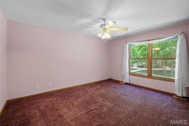 Tucked among the trees this spacious 4-bedroom retreat offers on Innsbrook Resort Golf Course in Missouri - for sale on GolfHomes.com, golf home, golf lot
