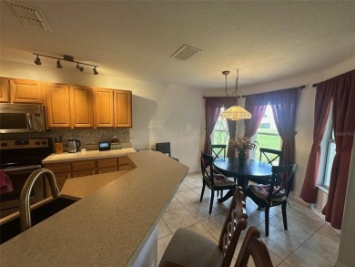 Charming 2 Bedroom + Study, 2 Bath Home in Premier 55+ Gated on On Top of the World Golf Course in Florida - for sale on GolfHomes.com, golf home, golf lot