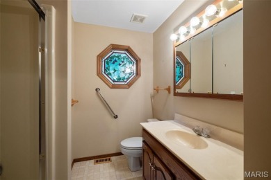 Tucked among the trees this spacious 4-bedroom retreat offers on Innsbrook Resort Golf Course in Missouri - for sale on GolfHomes.com, golf home, golf lot