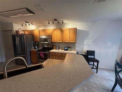 Charming 2 Bedroom + Study, 2 Bath Home in Premier 55+ Gated on On Top of the World Golf Course in Florida - for sale on GolfHomes.com, golf home, golf lot