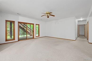 Tucked among the trees this spacious 4-bedroom retreat offers on Innsbrook Resort Golf Course in Missouri - for sale on GolfHomes.com, golf home, golf lot