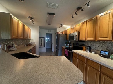 Charming 2 Bedroom + Study, 2 Bath Home in Premier 55+ Gated on On Top of the World Golf Course in Florida - for sale on GolfHomes.com, golf home, golf lot