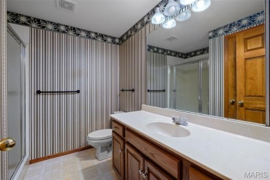 Tucked among the trees this spacious 4-bedroom retreat offers on Innsbrook Resort Golf Course in Missouri - for sale on GolfHomes.com, golf home, golf lot