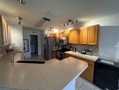 Charming 2 Bedroom + Study, 2 Bath Home in Premier 55+ Gated on On Top of the World Golf Course in Florida - for sale on GolfHomes.com, golf home, golf lot