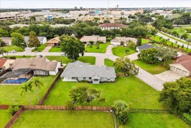 Welcome to this beautifully remodeled 5-bedroom, 3-bath home on Orange Tree Golf Club in Florida - for sale on GolfHomes.com, golf home, golf lot