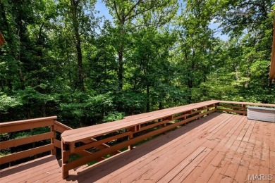 Tucked among the trees this spacious 4-bedroom retreat offers on Innsbrook Resort Golf Course in Missouri - for sale on GolfHomes.com, golf home, golf lot
