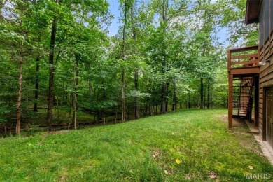 Tucked among the trees this spacious 4-bedroom retreat offers on Innsbrook Resort Golf Course in Missouri - for sale on GolfHomes.com, golf home, golf lot