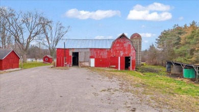 Nestled on 30.2 prime acres with development potential, this on Downing Farms Golf Course in Michigan - for sale on GolfHomes.com, golf home, golf lot