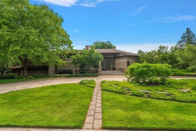 Presenting one of the most architecturally significant homes in on Watermark Country Club in Michigan - for sale on GolfHomes.com, golf home, golf lot